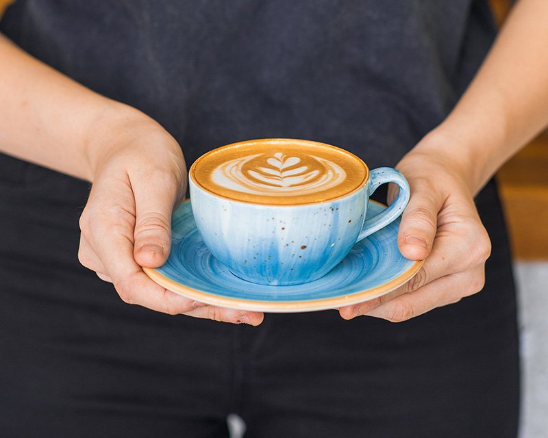 Latte art in ceramic cup
